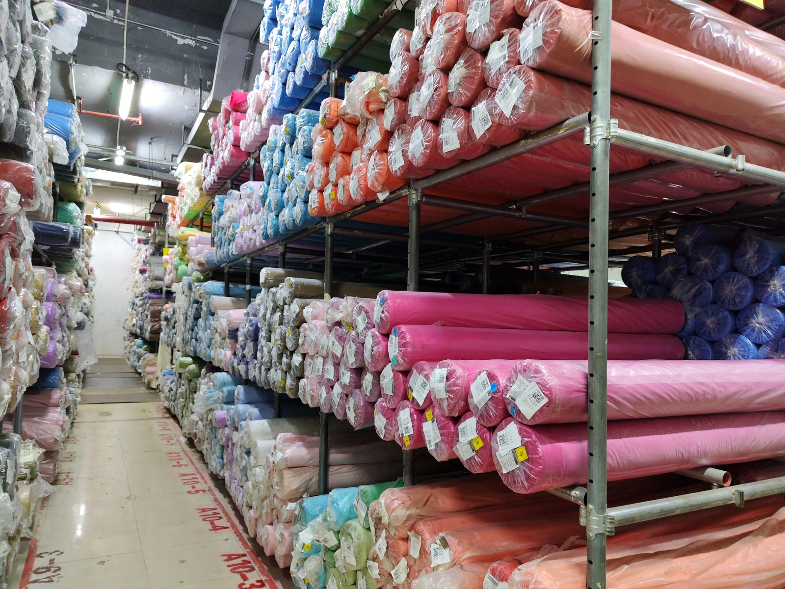 Color fabric roll inventory wall