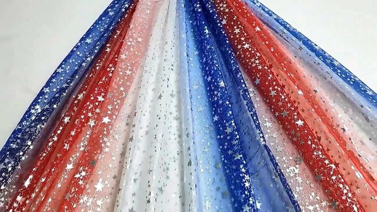 Metallic star tulle in multiple colors for party dresses, eveningwear and dance costumes