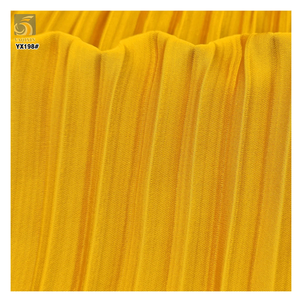 Yellow pleated satin fabric texture
